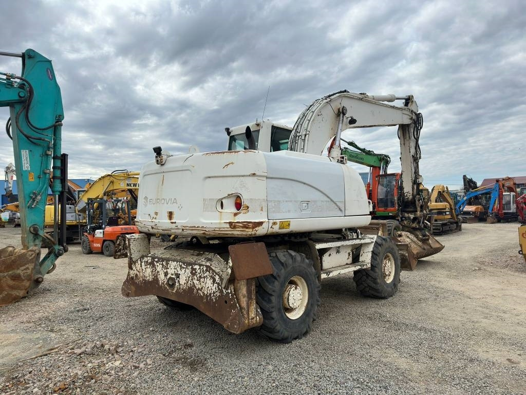 Pelle sur pneus CAT M 316 D: photos 6