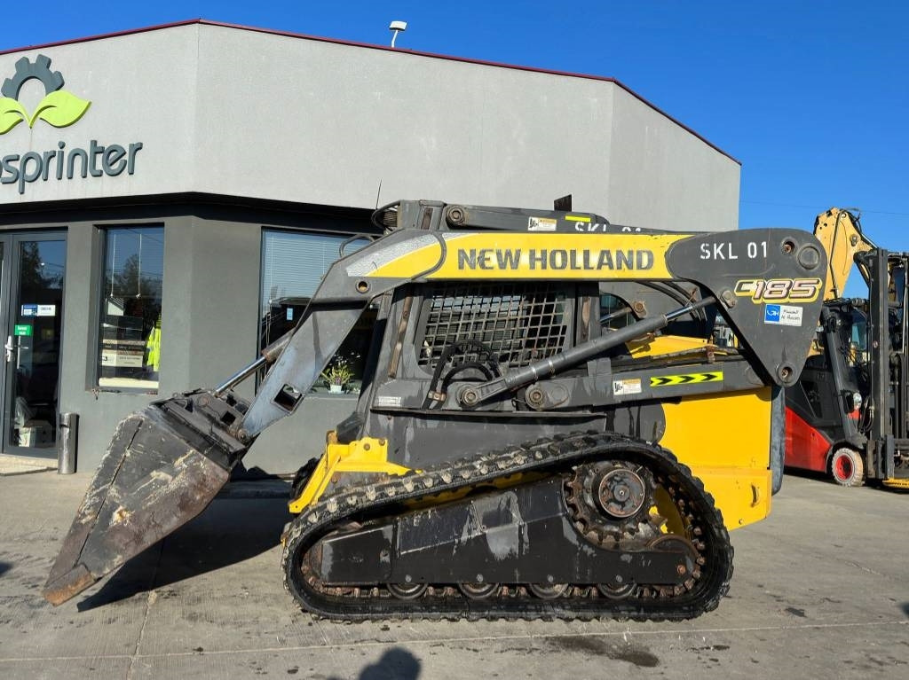 New Holland C 185 - Chargeuse compacte sur chenilles: photos 2 New Holland C 185 - Chargeuse compacte sur chenilles: photos 2