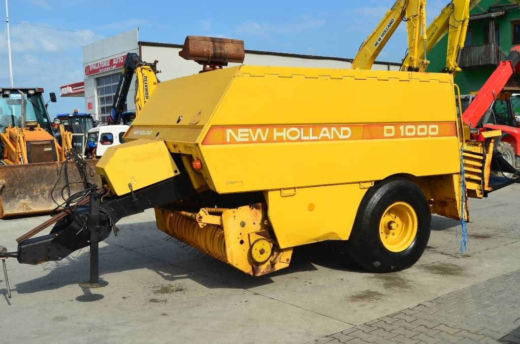 New Holland D1000 - Presse à balles cubiques: photos 1 New Holland D1000 - Presse à balles cubiques: photos 1
