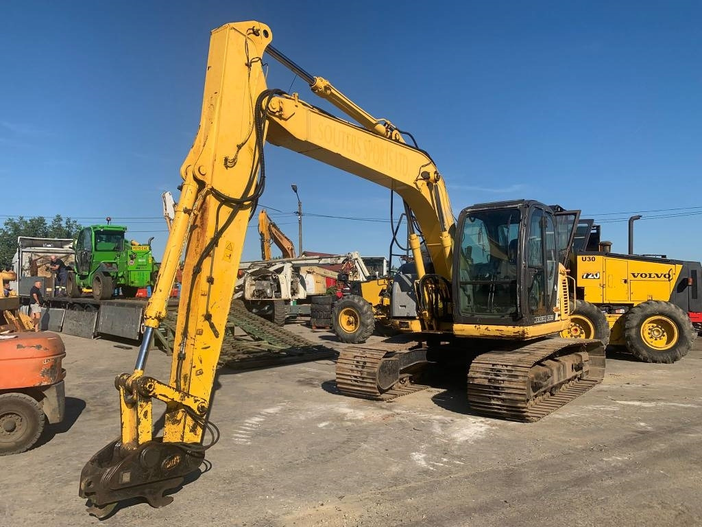 New Holland E 135 SR - Pelle sur chenille: photos 5 New Holland E 135 SR - Pelle sur chenille: photos 5