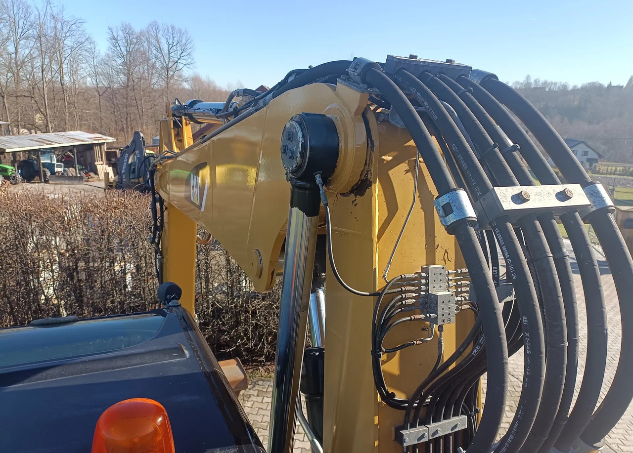 CATERPILLAR M313D - Pelle sur pneus: photos 4 CATERPILLAR M313D - Pelle sur pneus: photos 4