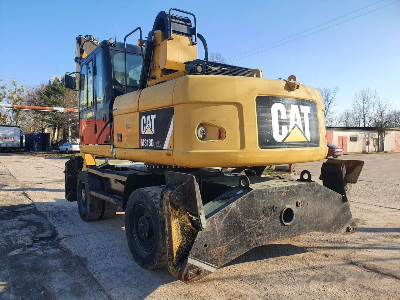 Pelle de manutention Caterpillar 318 D MH: photos 13