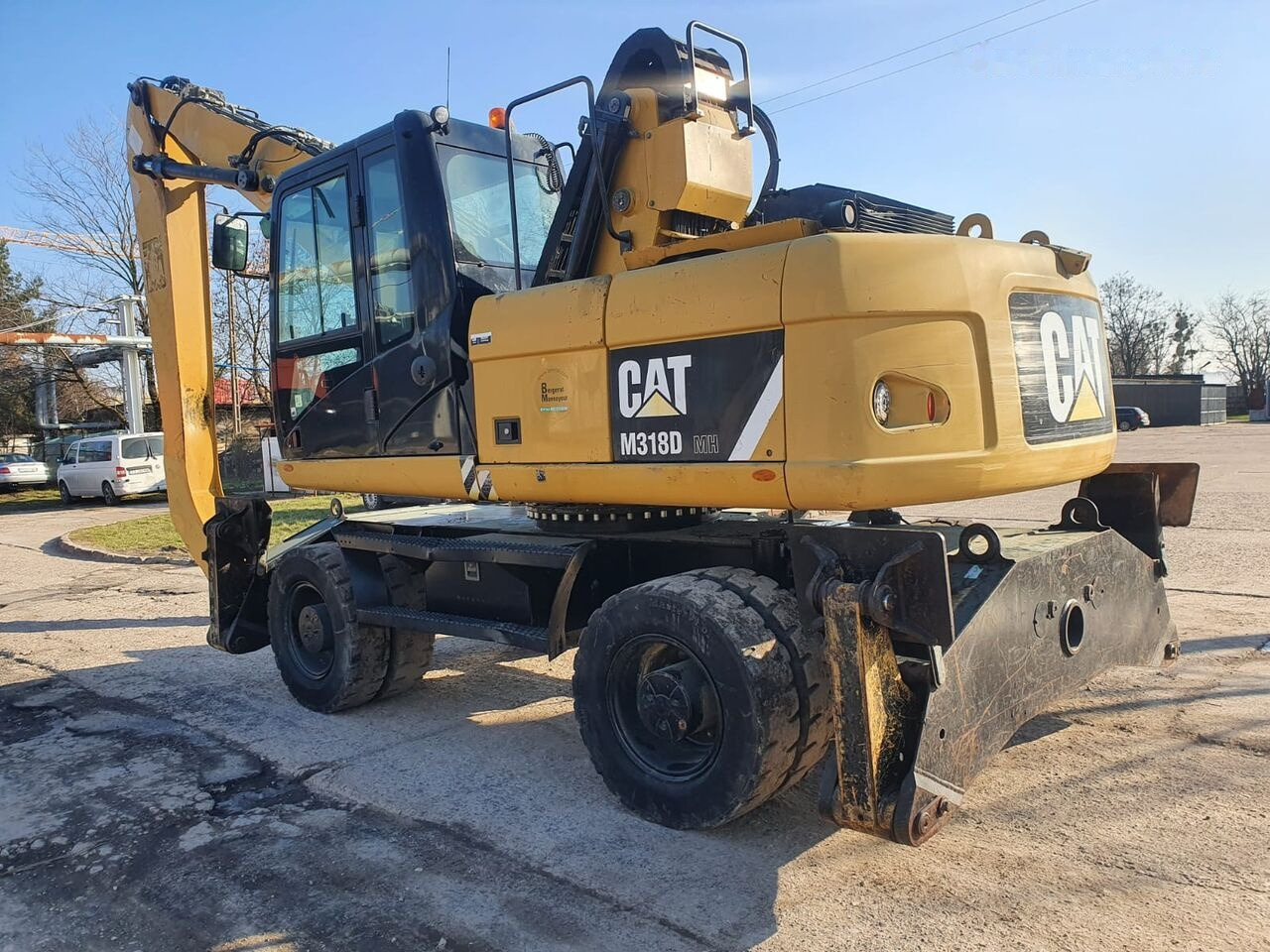 Pelle de manutention Caterpillar 318 D MH: photos 14