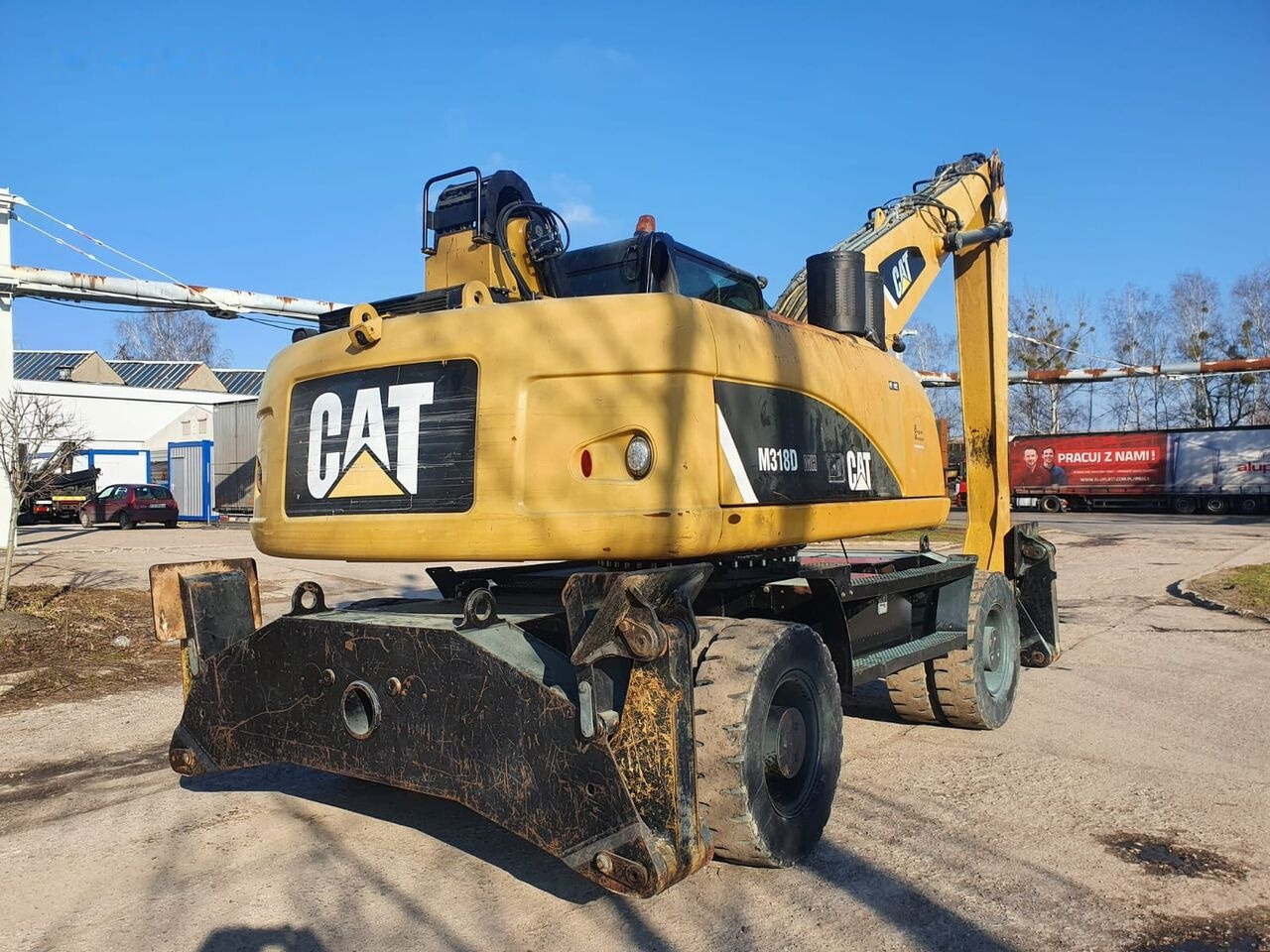 Pelle de manutention Caterpillar 318 D MH: photos 11