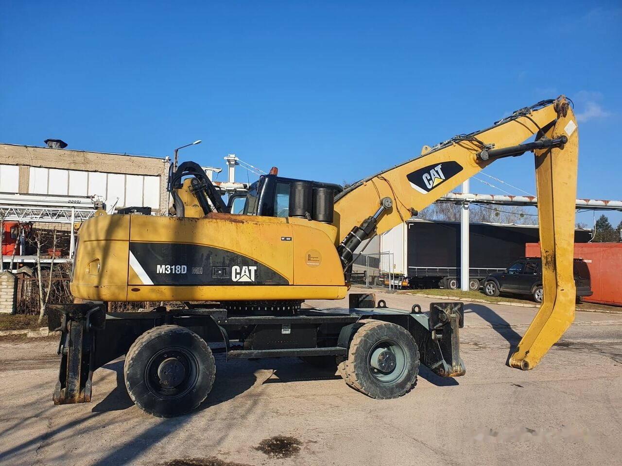 Pelle de manutention Caterpillar 318 D MH: photos 9