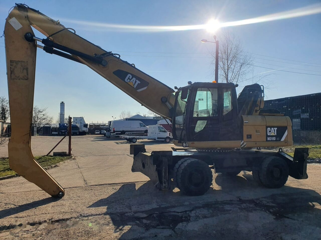 Pelle de manutention Caterpillar 318 D MH: photos 16