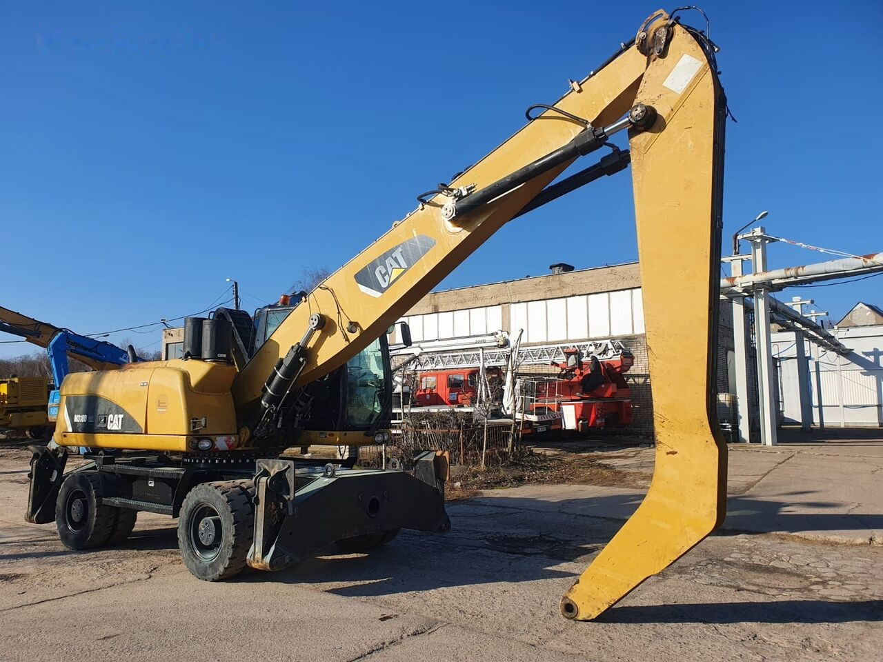 Pelle de manutention Caterpillar 318 D MH: photos 7