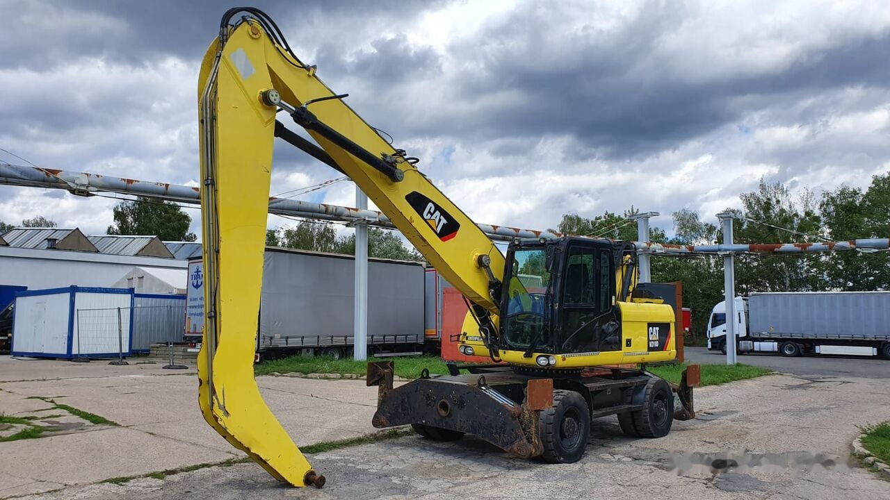 Caterpillar M 318 D MH - Pelle de manutention: photos 3 Caterpillar M 318 D MH - Pelle de manutention: photos 3