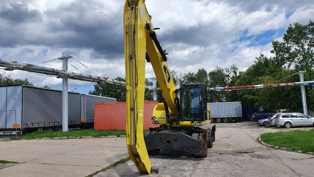 Caterpillar M 318 D MH - Pelle de manutention: photos 4 Caterpillar M 318 D MH - Pelle de manutention: photos 4