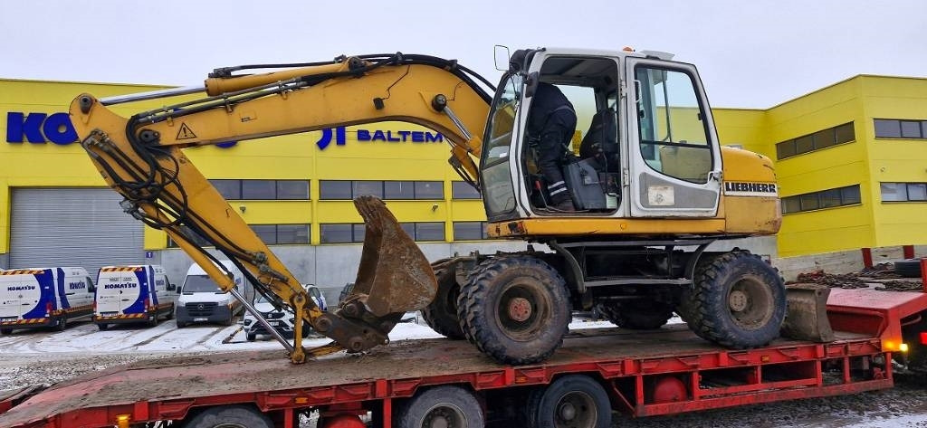 Liebherr A 314 - Pelle sur pneus: photos 4 Liebherr A 314 - Pelle sur pneus: photos 4