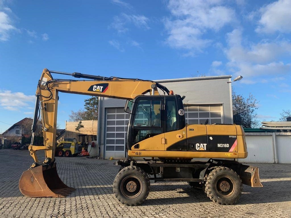CAT M 316 D - Pelle sur pneus: photos 2 CAT M 316 D - Pelle sur pneus: photos 2