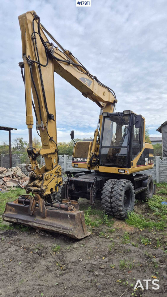 2000 CAT M312 - Pelle sur pneus: photos 2 2000 CAT M312 - Pelle sur pneus: photos 2