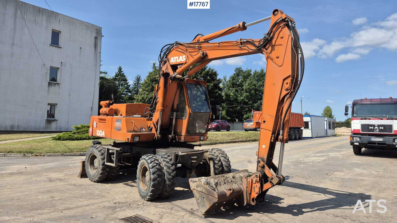 ATLAS 1304 wheeled excavator (1993) - Pelle sur pneus: photos 2 ATLAS 1304 wheeled excavator (1993) - Pelle sur pneus: photos 2