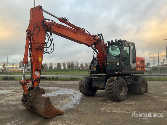 2010 Hitachi ZX140W-3 Wheel Excavator - Pelle sur pneus: photos 1 2010 Hitachi ZX140W-3 Wheel Excavator - Pelle sur pneus: photos 1