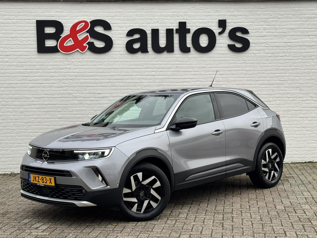 Opel Mokka-1.2 Turbo Elegance Cruise control Climate control Stoel- stuurverwarming Apple / Android Parkeersensoren plus camera - SUV: photos 1 Opel Mokka-1.2 Turbo Elegance Cruise control Climate control Stoel- stuurverwarming Apple / Android Parkeersensoren plus camera - SUV: photos 1