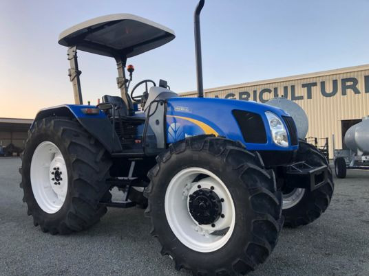 New Holland TL100A tracteur - Tracteur agricole: photos 1 New Holland TL100A tracteur - Tracteur agricole: photos 1