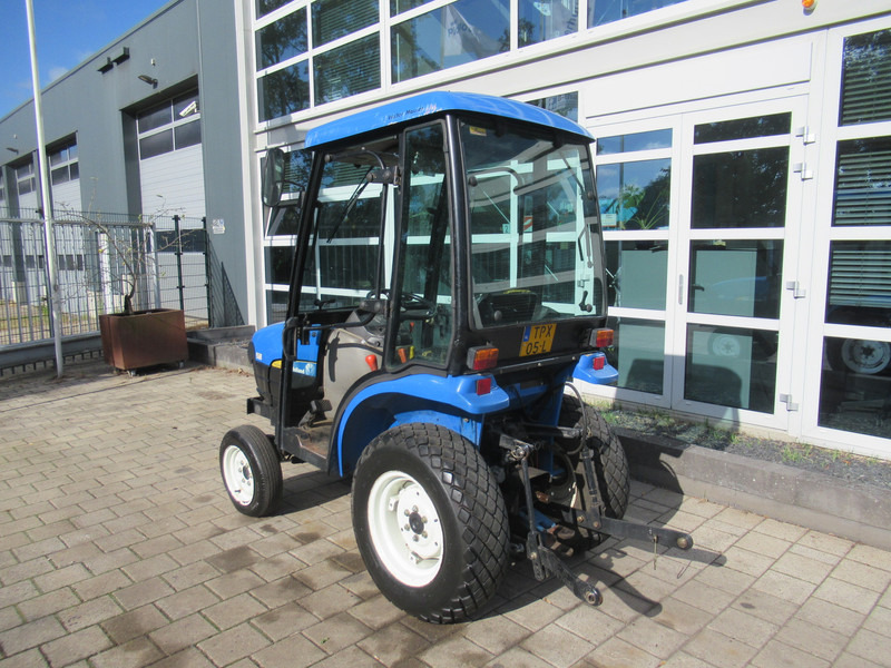 New Holland TC21D 4WD 4x4 Cabine Verwarming - Tracteur agricole: photos 3 New Holland TC21D 4WD 4x4 Cabine Verwarming - Tracteur agricole: photos 3