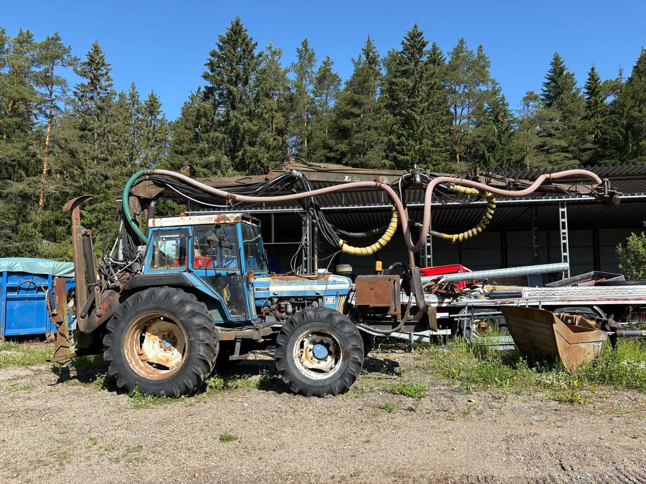 Rock drill Doofor DF530S and Tractor Ford New Holland 5610 - Autre matériel: photos 1 Rock drill Doofor DF530S and Tractor Ford New Holland 5610 - Autre matériel: photos 1