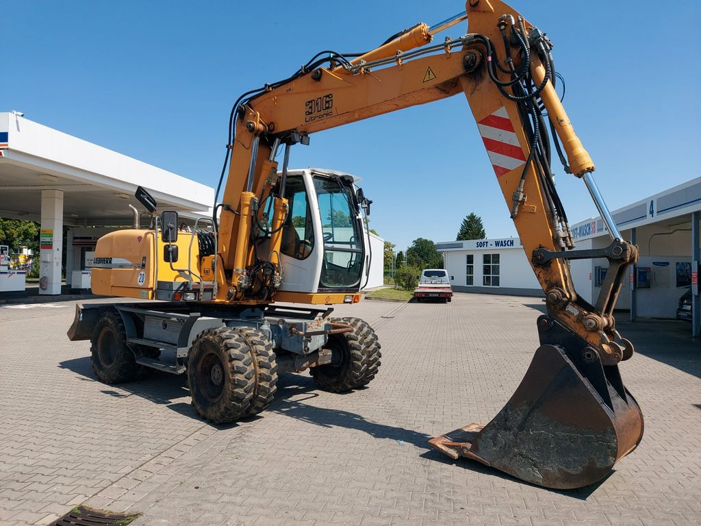 Liebherr A 316 LITRONIC TL + 2005 DEUTZ 13400 STD. - Pelle sur pneus: photos 3 Liebherr A 316 LITRONIC TL + 2005 DEUTZ 13400 STD. - Pelle sur pneus: photos 3