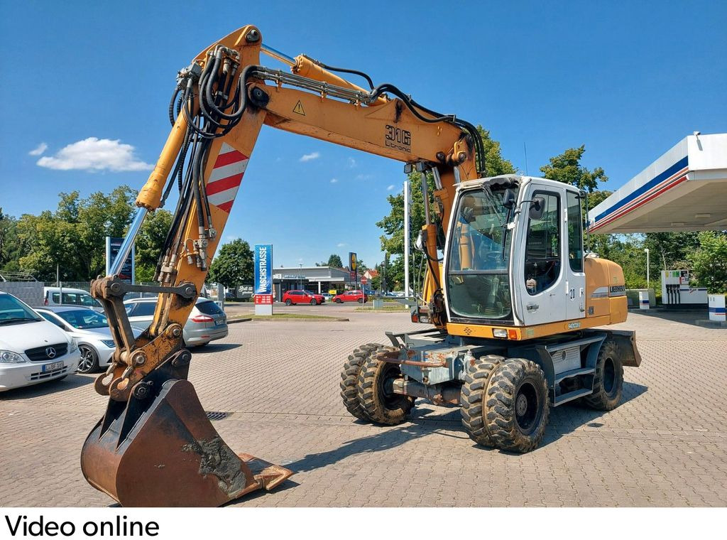 Liebherr A 316 LITRONIC TL + 2005 DEUTZ 13400 STD. - Pelle sur pneus: photos 1 Liebherr A 316 LITRONIC TL + 2005 DEUTZ 13400 STD. - Pelle sur pneus: photos 1