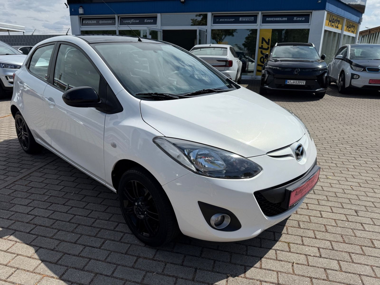 Mazda 2 Lim. 1.3 Origami 5 TÜER KLIMA SHZ TÜV NEU - Voiture: photos 2 Mazda 2 Lim. 1.3 Origami 5 TÜER KLIMA SHZ TÜV NEU - Voiture: photos 2