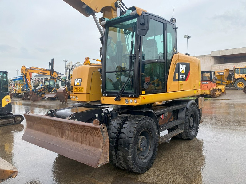 Caterpillar M318F NVT - Pelle sur pneus: photos 3 Caterpillar M318F NVT - Pelle sur pneus: photos 3