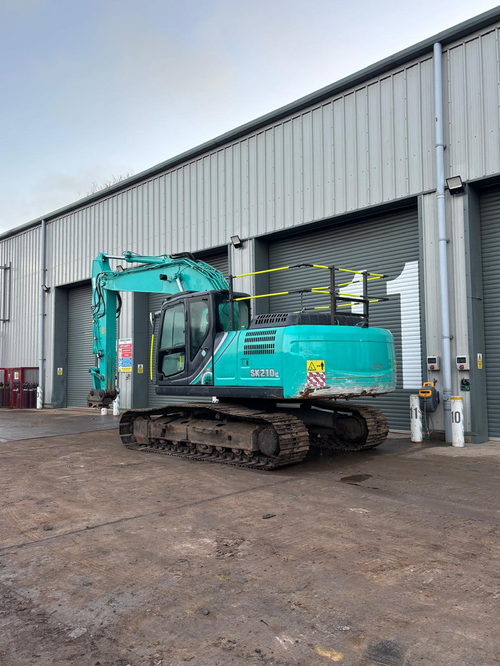 Kobelco SK210LC-10 - Pelle sur chenille: photos 3 Kobelco SK210LC-10 - Pelle sur chenille: photos 3