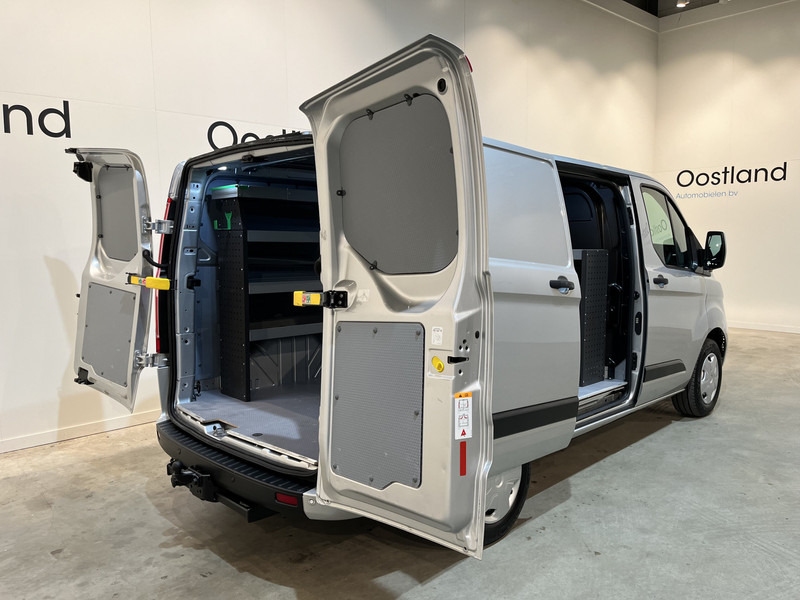 Ford Transit Custom 280 2.0 TDCI L1H1 Trend 130 PK Servicebus / Inrichting / Euro 6 / Airco / PDC / Cruise Control / Navigatie / CarPlay / Trekhaak / 3-Zits / 96.300 KM !! / BPM VRIJ !! - Fourgonnette: photos 2 Ford Transit Custom 280 2.0 TDCI L1H1 Trend 130 PK Servicebus / Inrichting / Euro 6 / Airco / PDC / Cruise Control / Navigatie / CarPlay / Trekhaak / 3-Zits / 96.300 KM !! / BPM VRIJ !! - Fourgonnette: photos 2