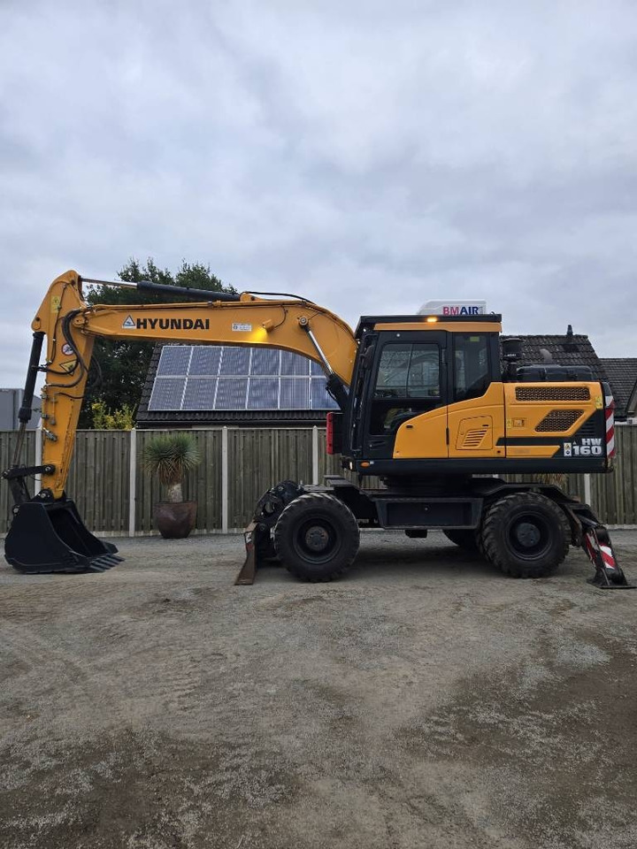 Hyundai HW 160 - Pelle sur pneus: photos 1 Hyundai HW 160 - Pelle sur pneus: photos 1