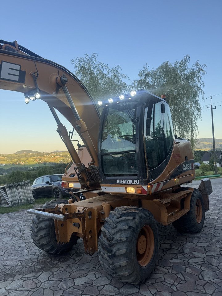 Case WX145 - Pelle sur pneus: photos 2 Case WX145 - Pelle sur pneus: photos 2