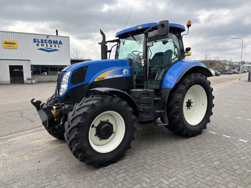 New Holland T6080 Power Command - Tracteur agricole: photos 1 New Holland T6080 Power Command - Tracteur agricole: photos 1