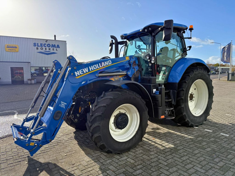 New Holland T7.210 AC Stage V + TL770 Voorlader - Tracteur agricole: photos 1 New Holland T7.210 AC Stage V + TL770 Voorlader - Tracteur agricole: photos 1