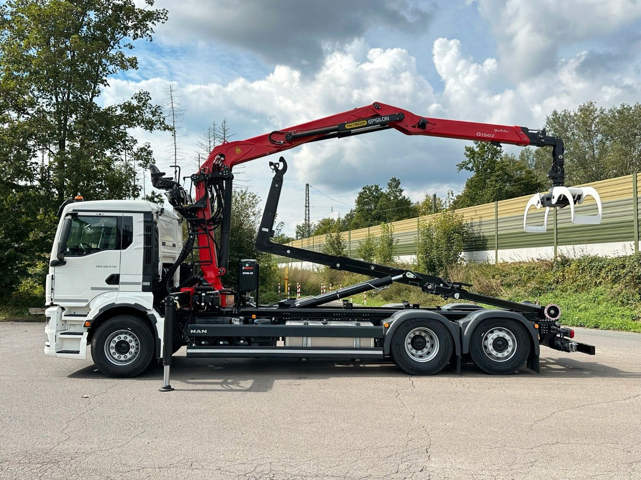 MAN TGS 26.470 6x2 Abrollkipper + Kran EPSILON - Camion ampliroll, Camion grue: photos 2 MAN TGS 26.470 6x2 Abrollkipper + Kran EPSILON - Camion ampliroll, Camion grue: photos 2