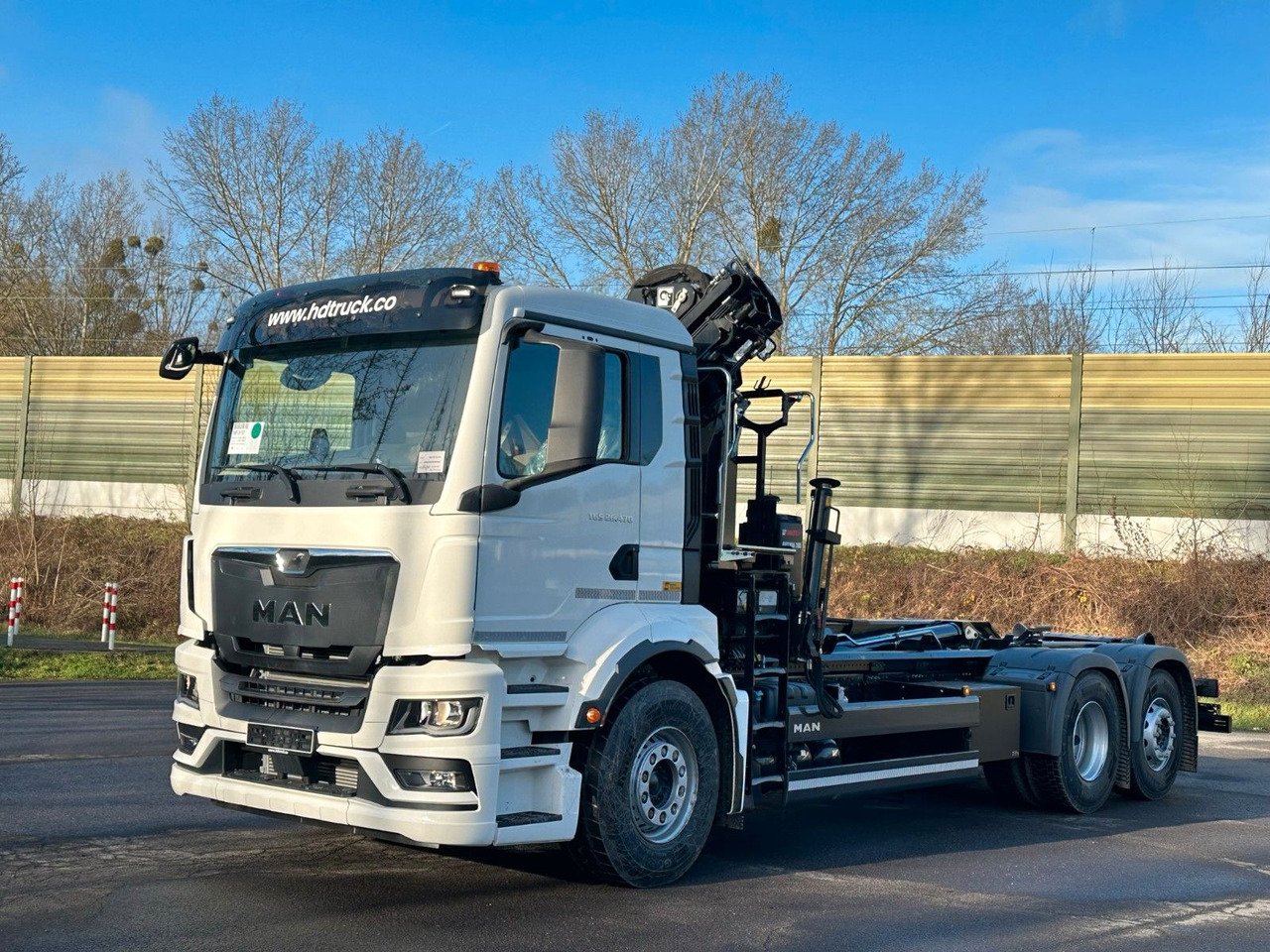 MAN TGS 26.470 6x2 Abrollkipper + Kran Hiab 138-3 - Camion ampliroll, Camion grue: photos 2 MAN TGS 26.470 6x2 Abrollkipper + Kran Hiab 138-3 - Camion ampliroll, Camion grue: photos 2