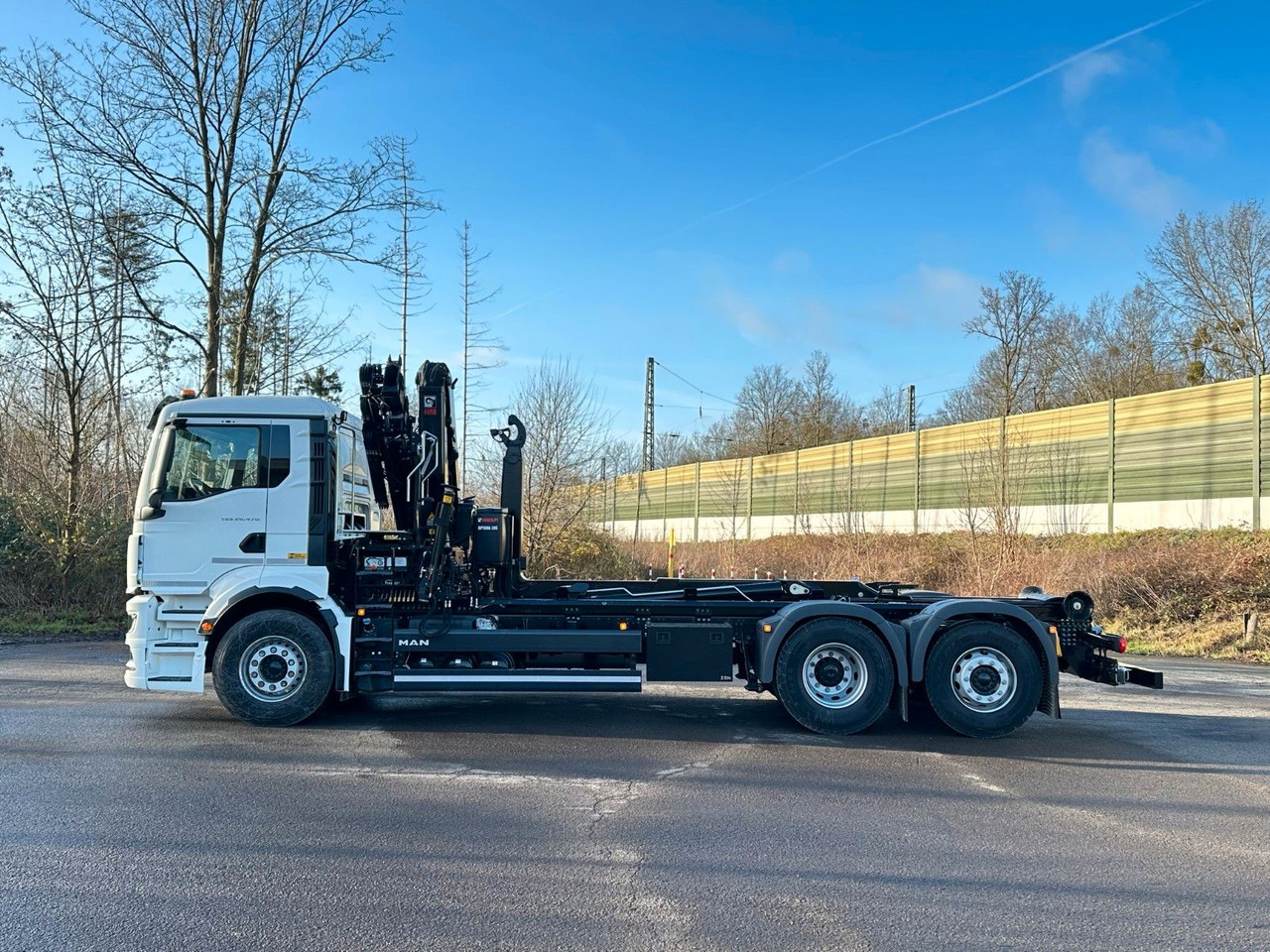 MAN TGS 26.470 6x2 Abrollkipper + Kran Hiab 138-3 - Camion ampliroll, Camion grue: photos 3 MAN TGS 26.470 6x2 Abrollkipper + Kran Hiab 138-3 - Camion ampliroll, Camion grue: photos 3