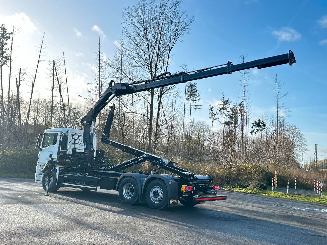MAN TGS 26.470 6x2 Abrollkipper + Kran Hiab 138-3 - Camion ampliroll, Camion grue: photos 4 MAN TGS 26.470 6x2 Abrollkipper + Kran Hiab 138-3 - Camion ampliroll, Camion grue: photos 4