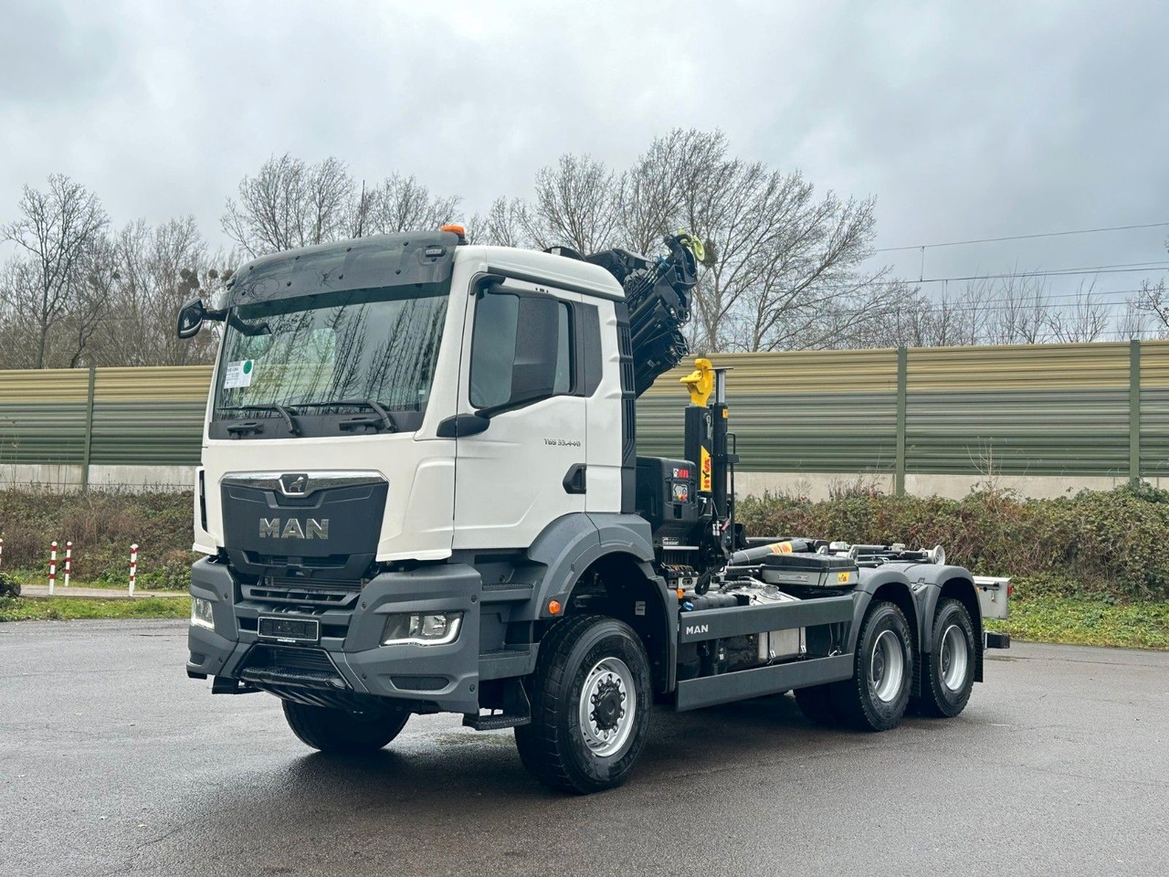 MAN TGS 33.440 6x6 BB Abrollkipper+Kran Hiab 228-6 - Camion ampliroll, Camion grue: photos 2 MAN TGS 33.440 6x6 BB Abrollkipper+Kran Hiab 228-6 - Camion ampliroll, Camion grue: photos 2