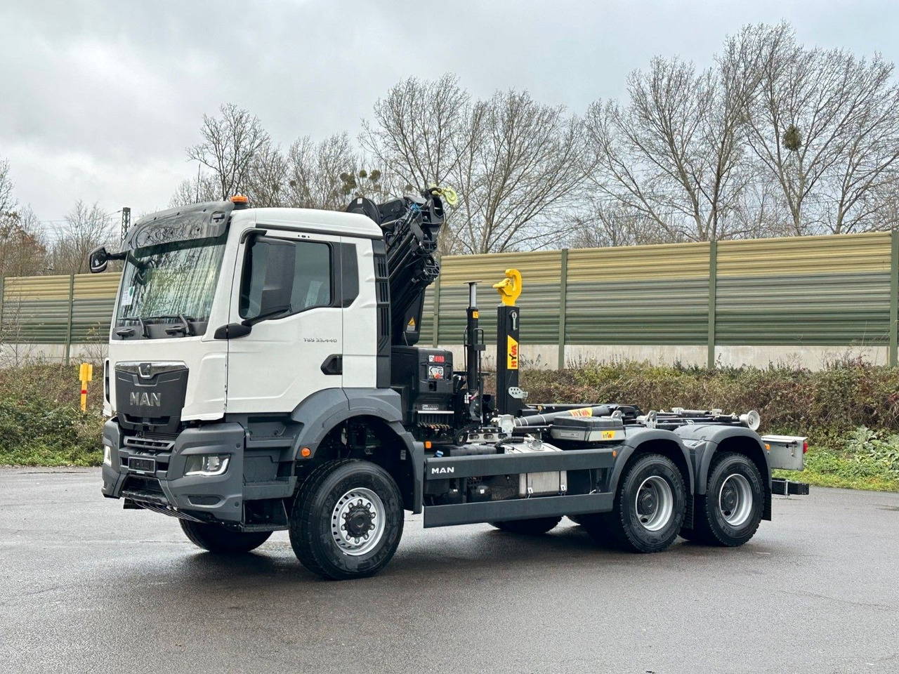 MAN TGS 33.440 6x6 BB Abrollkipper+Kran Hiab 228-6 - Camion ampliroll, Camion grue: photos 3 MAN TGS 33.440 6x6 BB Abrollkipper+Kran Hiab 228-6 - Camion ampliroll, Camion grue: photos 3