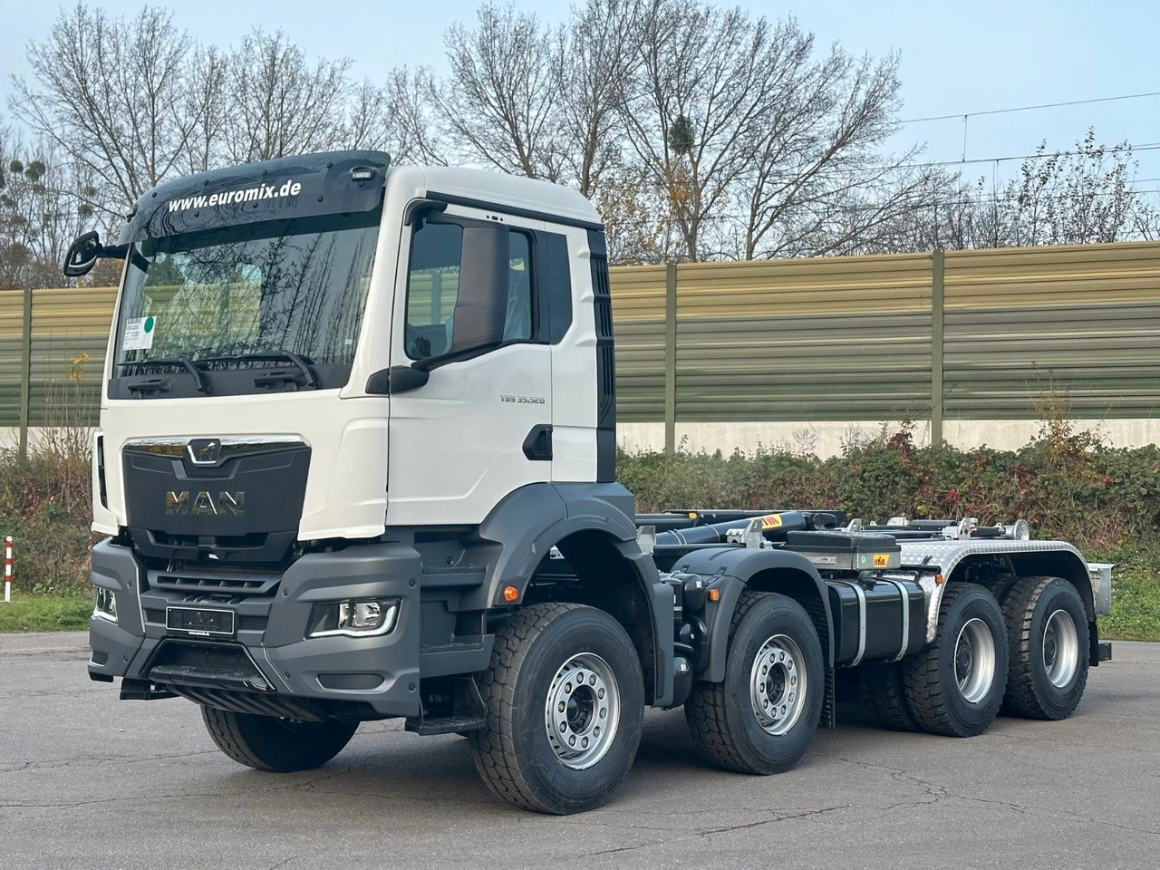 MAN TGS 35.520 8x4 Euro6e Hyva 26-55 Abrollkipper - Camion ampliroll: photos 2 MAN TGS 35.520 8x4 Euro6e Hyva 26-55 Abrollkipper - Camion ampliroll: photos 2