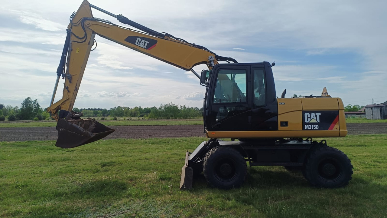 Caterpillar M315D - Pelle sur chenille: photos 1 Caterpillar M315D - Pelle sur chenille: photos 1