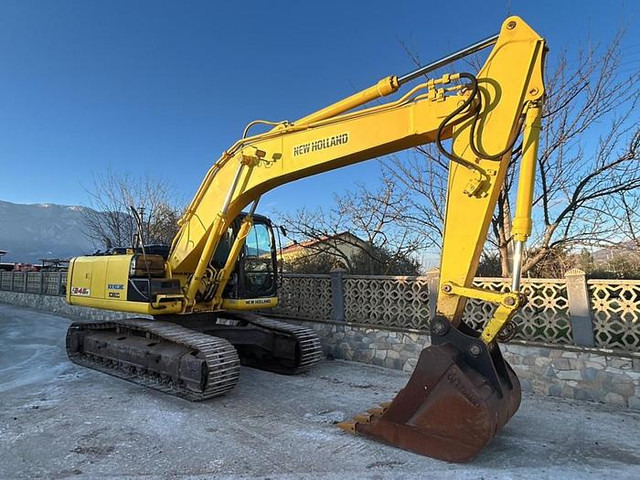 New Holland E245B - Pelle: photos 1 New Holland E245B - Pelle: photos 1