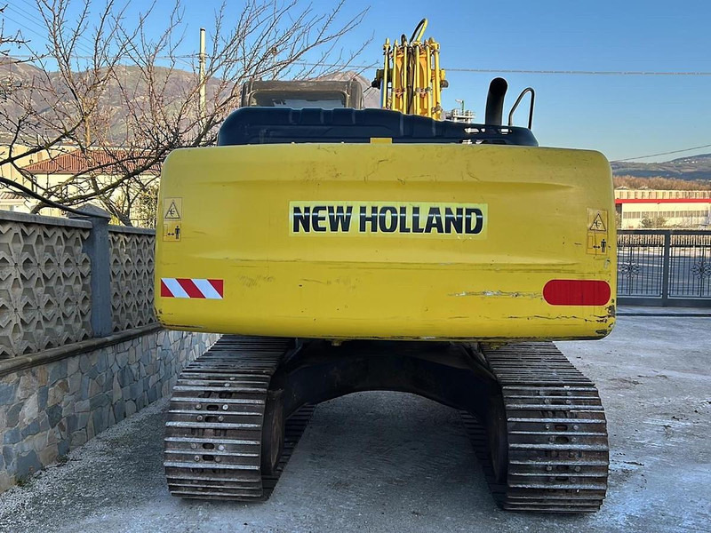 New Holland E245B - Pelle: photos 5 New Holland E245B - Pelle: photos 5