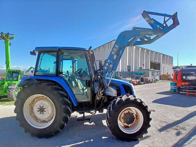 New Holland TL90A - Tracteur agricole: photos 1 New Holland TL90A - Tracteur agricole: photos 1