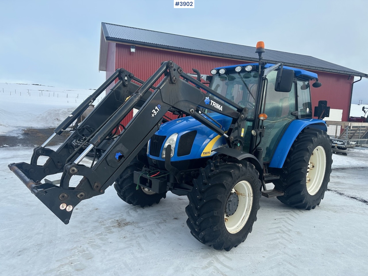2011 New Holland T5070 4x4 m/ frontlaster - Tracteur agricole: photos 1 2011 New Holland T5070 4x4 m/ frontlaster - Tracteur agricole: photos 1