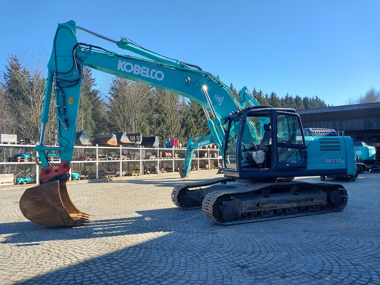 Kobelco SK210LC-10 - Pelle sur chenille: photos 1 Kobelco SK210LC-10 - Pelle sur chenille: photos 1