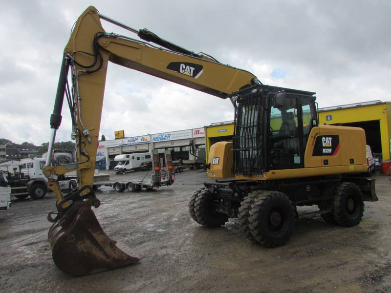 Cat M 320 F Mobilbagger 69.500 EUR / AC - Pelle sur pneus: photos 1 Cat M 320 F Mobilbagger 69.500 EUR / AC - Pelle sur pneus: photos 1