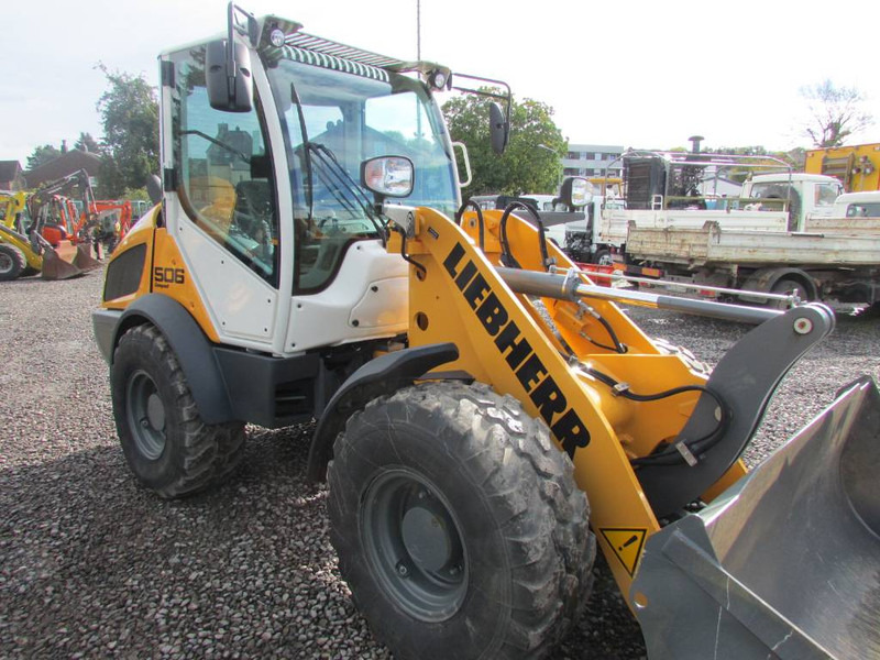 Liebherr L 506 Compact Radlader 46.500 EUR netto L506C - Chargeuse sur pneus: photos 3 Liebherr L 506 Compact Radlader 46.500 EUR netto L506C - Chargeuse sur pneus: photos 3