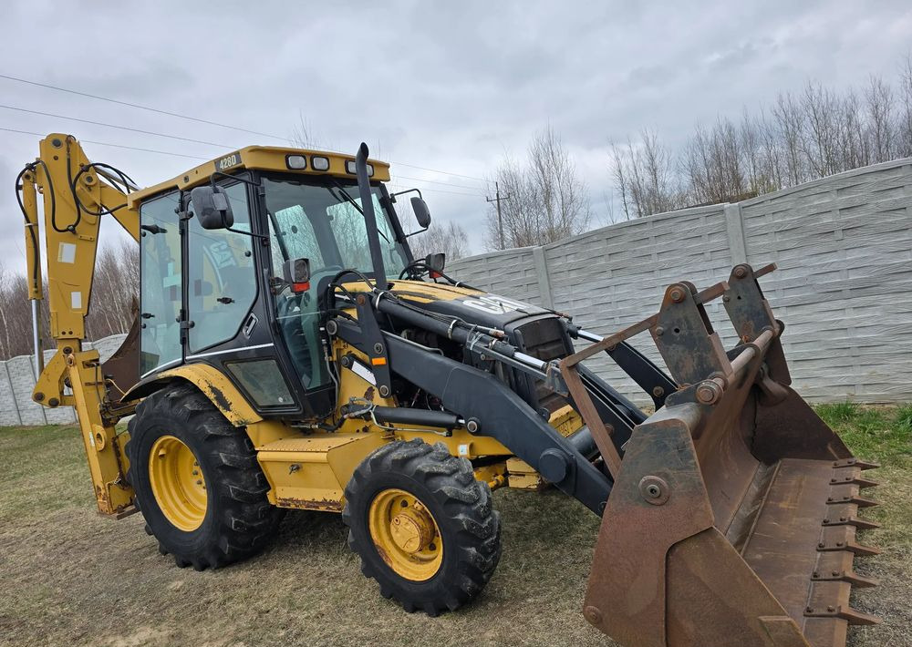 Caterpillar - Tractopelle: photos 2 Caterpillar - Tractopelle: photos 2