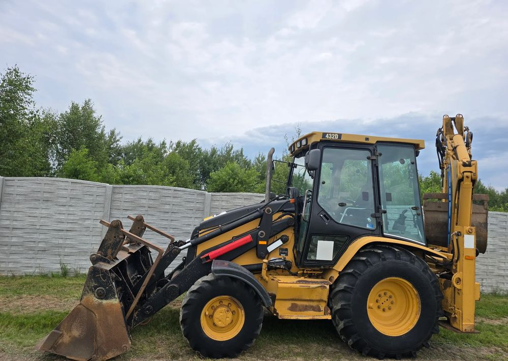 Caterpillar - Tractopelle: photos 4 Caterpillar - Tractopelle: photos 4