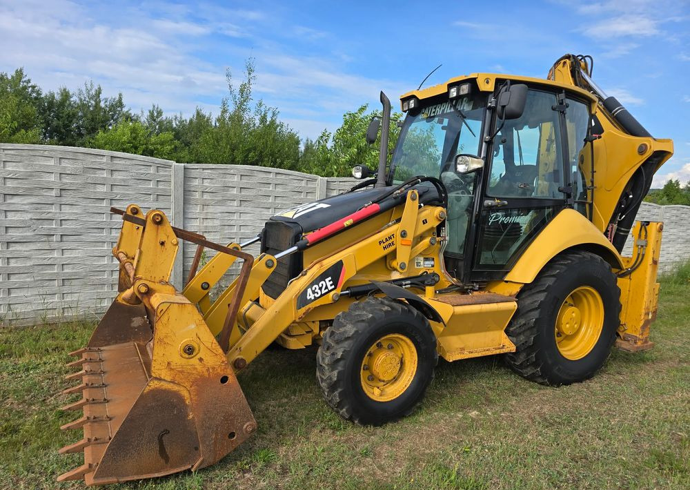 Caterpillar - Tractopelle: photos 1 Caterpillar - Tractopelle: photos 1
